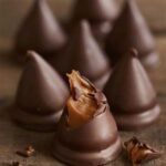 cachafaz-conitos-chocolate-negro-dulce-de-leche-caja6-228g.jpg_1_0a981bcd-0355-4c42-acf4-4bf532a0aaaf 400×400
